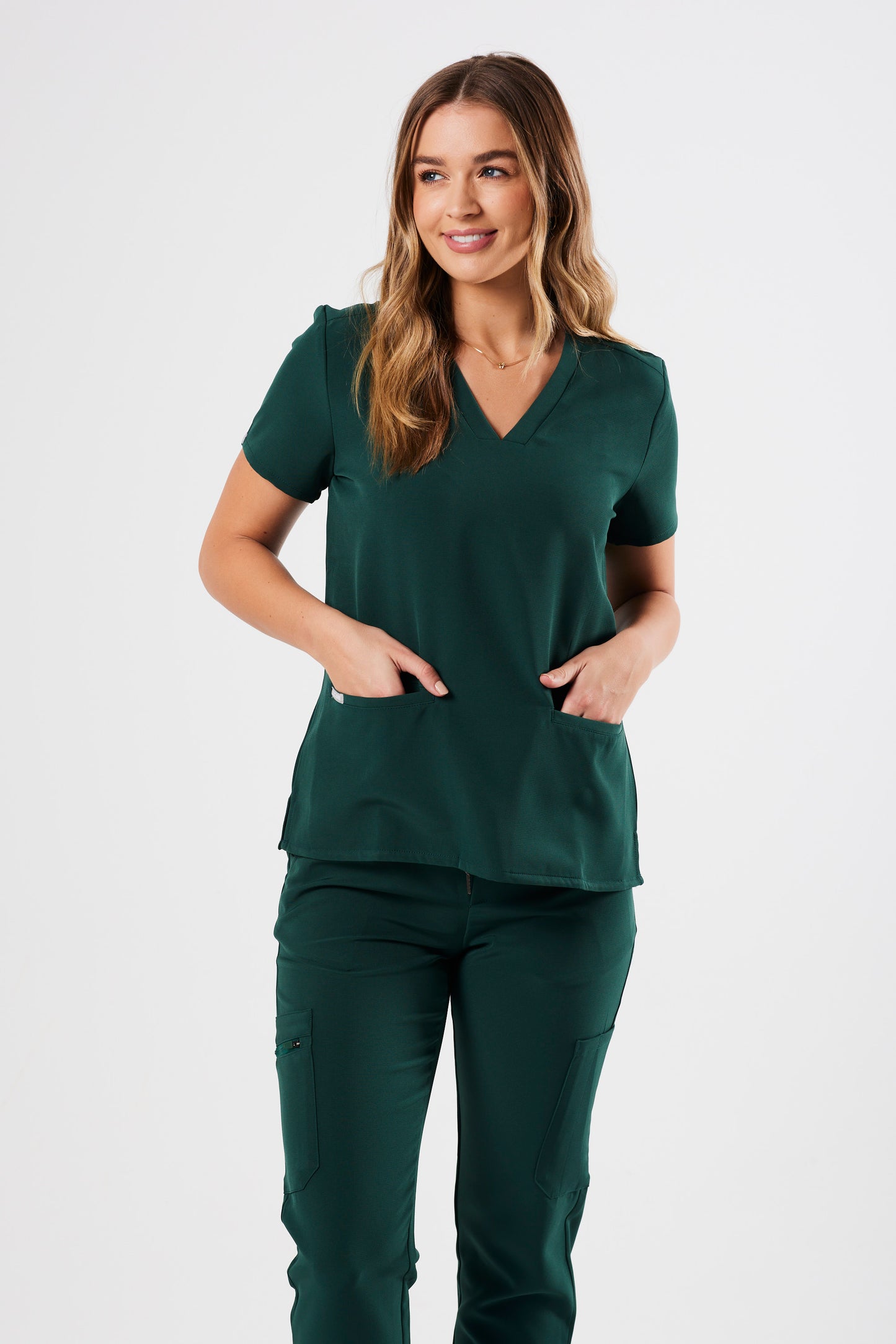FLEX TWO-POCKET WOMEN'S SCRUB TOP (EMERALD GREEN)